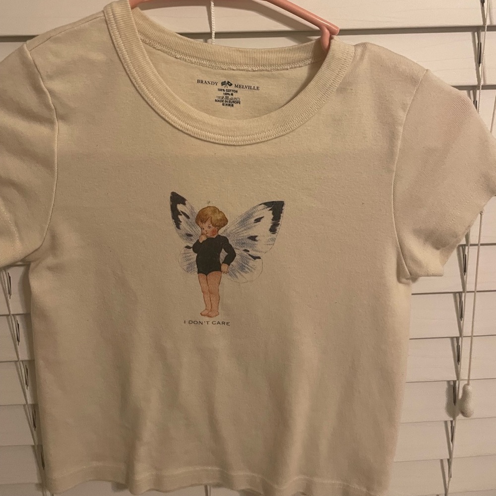 brandy melville "i don't care" fairy crop top shirt